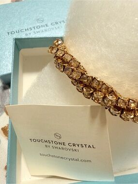Touchstone Crystal by Swarovski Twisted Golden Bracelet